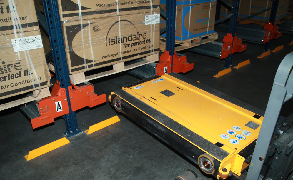 The shuttle lifts the pallet slightly, and moves it horizontally until it reaches the deepest available location