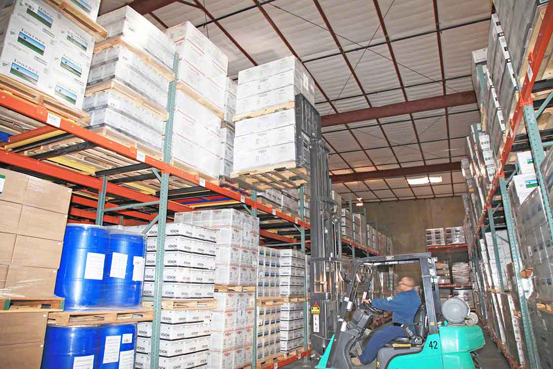 With push-back flow storage systems, goods are loaded and unloaded from the same end of the racks